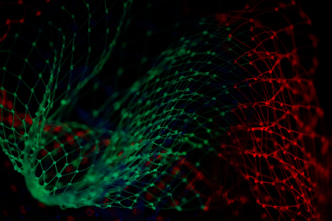 Green and red dots and lines in a mesh pattern